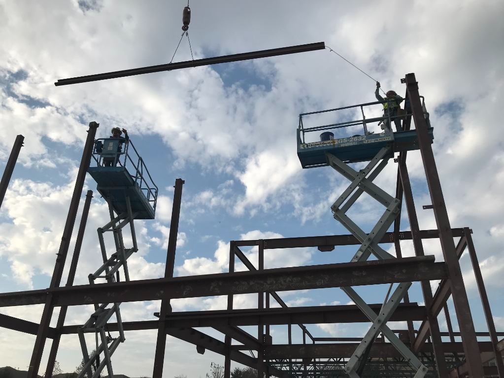 Steel beam erection on a commercial project